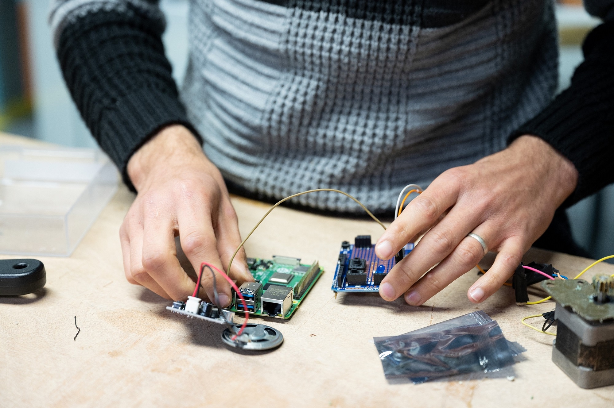 Illustrative picture, someone moving around an arduino card